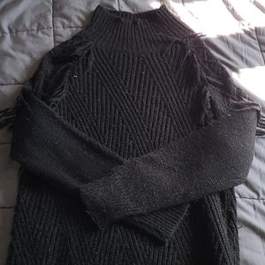 Knitted sweater with fringe